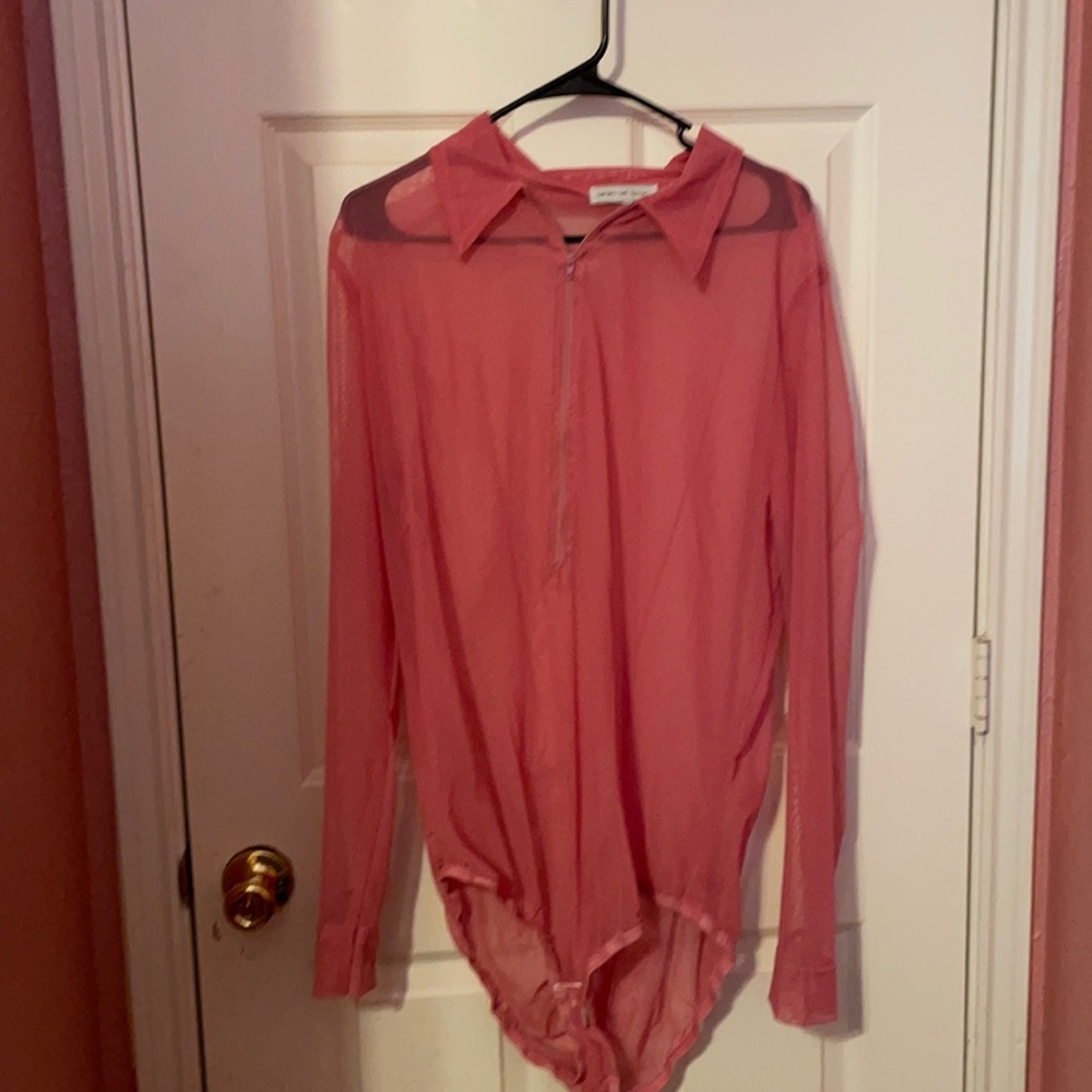 Ashley Nell Tipton pink mesh bodysuit